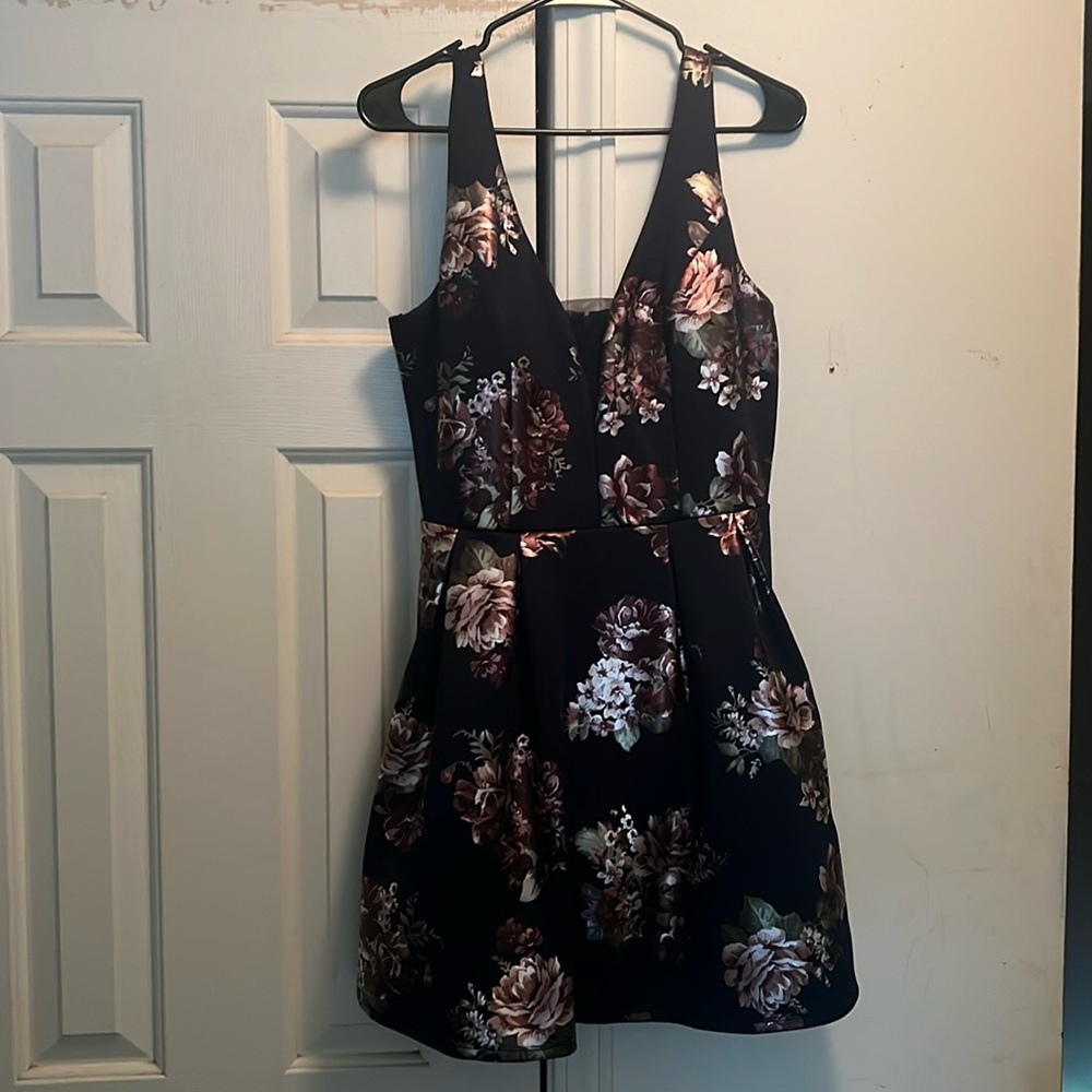Beautiful dark blue/floral party dress. Only worn once! Pristine condition!